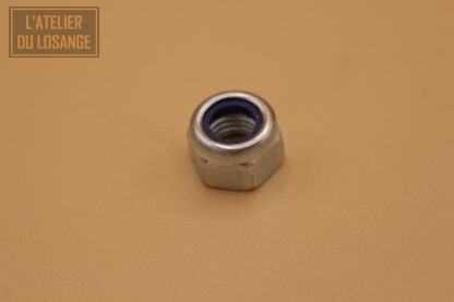 Ecrou Nylstop électrozingué M7